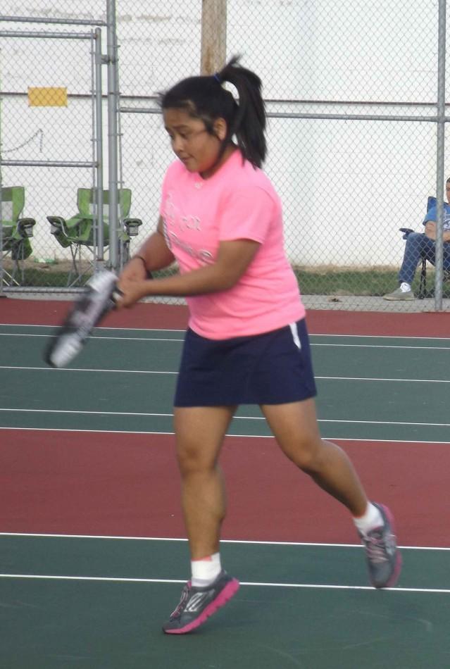 Joy Mateo played and won her first varsity match over Delphi as the Lady Kings swept the Oracles 5-0