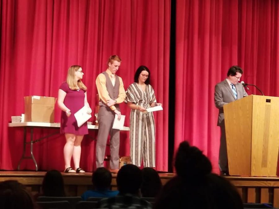 Megan Dishon, Cade Cox, and Ashli Key earned certificates for their achievements in AP English. They were just three of the 26 students to earn at least one award
