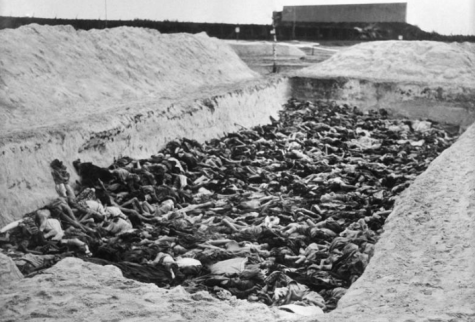 Mass grave with women and children in it.