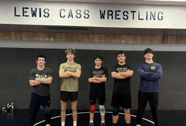 Back in Black: Five Wrestlers Advance to Regionals